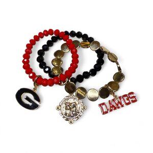 Three stretch Georgia Bulldog bracelets with charms